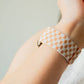 Tan Checkerboard Stretch Band